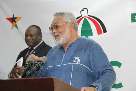 Former President Jerry John Rawlings (1st R) congratulating an NDC founding member Former President Jerry John Rawlings (1st R) congratulating an NDC founding member